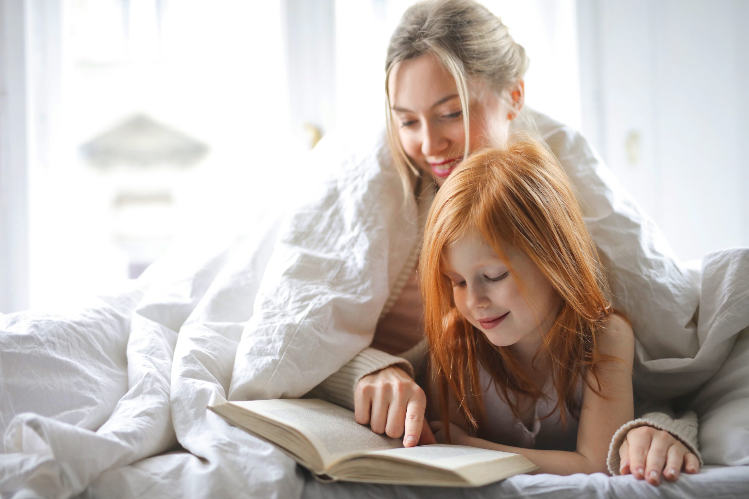 Photo Of Mother And Daughter Reading A Book While In Bed 3764491 Scaled 1, Cre8ion